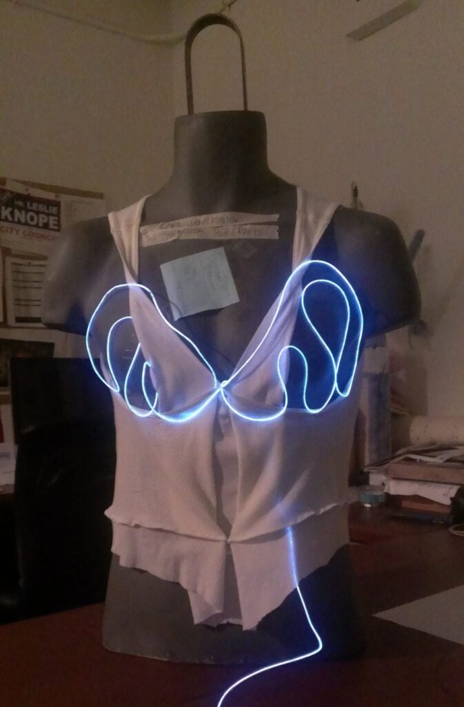 EL wire bra on mannequin